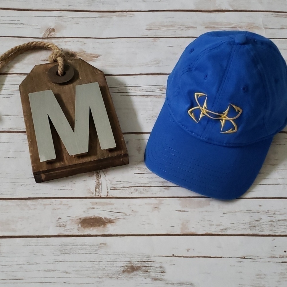 Under Armour blue hat with yellow logo embroidery